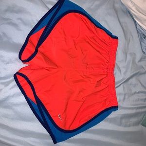 Neon coral running shorts